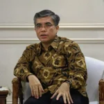 Indonesia postpones its 2026 minimum wage announcement to create a new, decentralized framework ensuring fair compensation based on regional decent living standards.