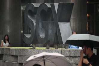 The STI gained 0.2% on Nov 27, tracking regional optimism fueled by US Fed rate cut expectations. Singapore's banking stocks showed mixed results.