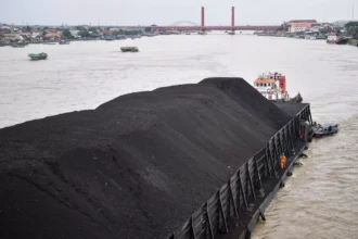 Indonesia plans to reduce its nickel output in 2026 to curb global oversupply and stabilize prices, marking a strategic shift in its resource management policy.