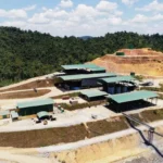 CNMC Goldmine shares surge over 19 percent as gold prices hit record highs, driven by geopolitical tensions and strong record earnings for the mining group.