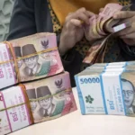 Authorities freeze Dana Syariah Indonesia bank accounts amid a 1.4 trillion rupiah debt default, launching a probe into assets and regulatory compliance.