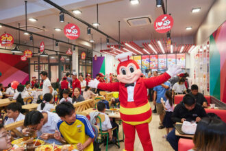Jollibee plans to list its international business on a US stock exchange by 2027 to fuel global growth and compete with world-class fast-food giants.