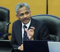 Bank Negara monitors global risks while maintaining the OPR at 2.75% to support Malaysia's resilient 5.2% growth and manage Middle East conflict impacts.