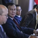 President Prabowo Subianto in a formal meeting, signaling strategic oversight for Danantara and national growth.