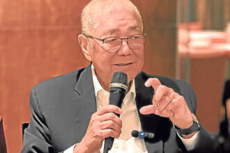 Eli Remolona Jr. discusses interest rate policy and the cautious stance of the BSP during an interview.