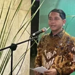 Forestry Minister Raja Juli Antoni speaking about inclusive carbon trading during a press conference in Jakarta.