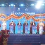 Dignitaries and dragon dancers celebrate the grand inauguration of the new steel plant by Hoa Phat in Tay Ninh.