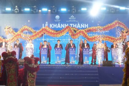 Dignitaries and dragon dancers celebrate the grand inauguration of the new steel plant by Hoa Phat in Tay Ninh.