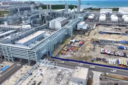 An aerial view of the Lotte Chemical Indonesia New Ethylene complex, highlighting massive industrial infrastructure.