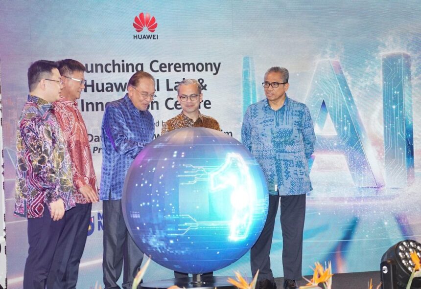 Prime Minister Anwar Ibrahim launching a technology center with global AI partners to boost digital innovation.