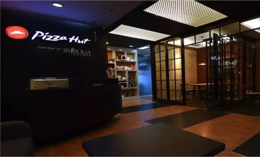 The modern interior of a Pizza Hut Indonesia office or outlet, highlighting the brand's local corporate identity.