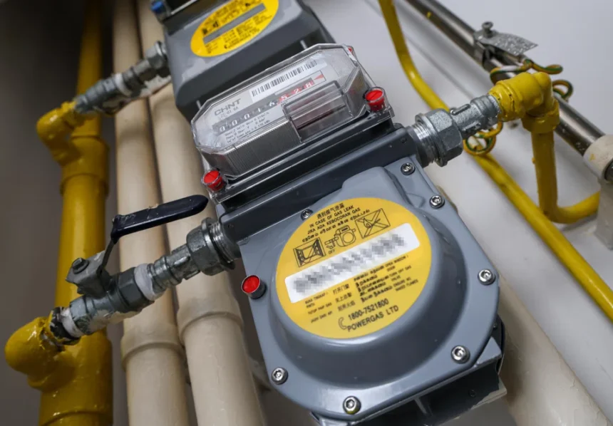 A close-up of residential gas meters in Singapore, monitored closely as global energy costs fluctuate.