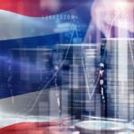 Stacked coins overlaid with the Thai flag and financial charts, representing growth trends in Thailand's banking sector.