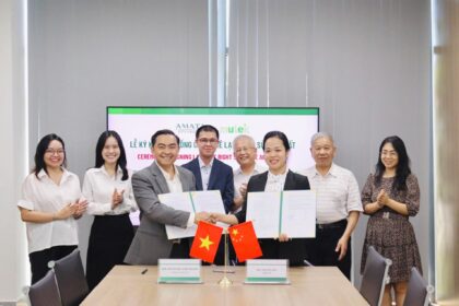 Representatives sign a land agreement for a new facility at Amata City