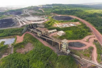 An aerial view of a sprawling coal mining facility representing the strategic infrastructure assets of BIPI.