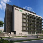 A modern architectural rendering of a multi-story DayOne data centre facility next to an urban road.