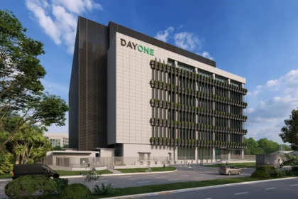 A modern architectural rendering of a multi-story DayOne data centre facility next to an urban road.