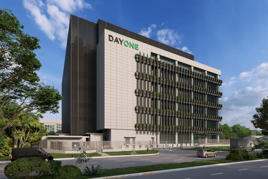 A modern architectural rendering of a multi-story DayOne data centre facility next to an urban road.
