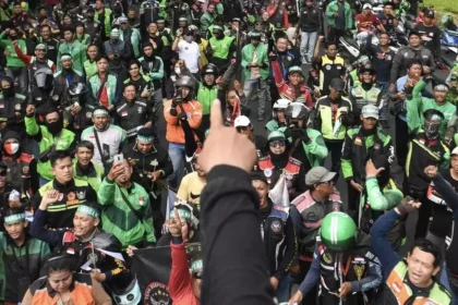 GoTo assesses Indonesia's new 92% fare share rule for drivers, a major regulatory shift aimed at enhancing gig worker welfare and industry sustainability.