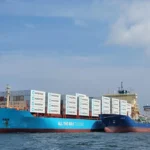Maersk container ship and tanker at sea, showcasing vessels that rely on marine fuel for global logistics operations.