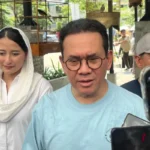 Trade Minister Budi Santoso providing a statement regarding the potential price adjustment of Minyakita cooking oil.