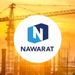 The NWR corporate logo positioned over a construction site at sunset