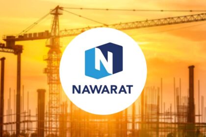 The NWR corporate logo positioned over a construction site at sunset