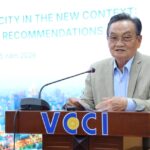 Dr. Tran Du Lich speaks at a business convention regarding incoming investment opportunities throughout HCM City.