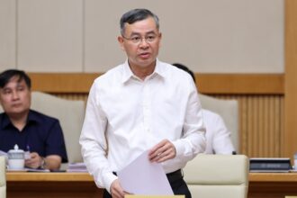 Finance Minister Ngo Van Tuan addressing state officials regarding inflation management and price controls in 2026.