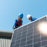 Technicians installing rooftop panels to support Thailand’s new solar financing and clean energy initiatives.