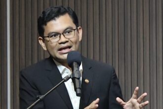 Malaysia's Economy Minister Akmal Nasrullah Mohd Nasir speaking at a press conference regarding fuel subsidy updates.