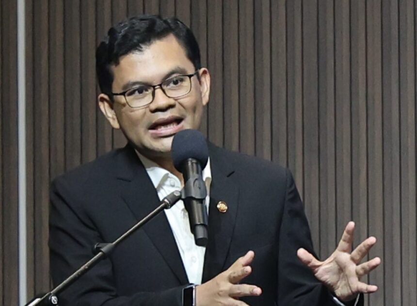Malaysia's Economy Minister Akmal Nasrullah Mohd Nasir speaking at a press conference regarding fuel subsidy updates.