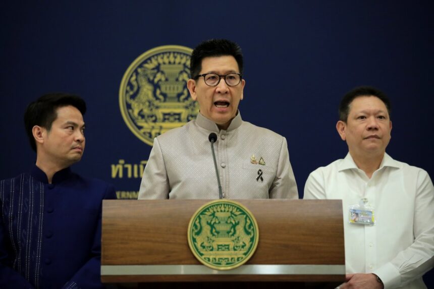 Thai officials announce a new borrowing decree during a formal press conference at the Government House.