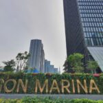 The exterior signboard of Saigon Marina IFC highlights the development of an integrated regional maritime financial hub.