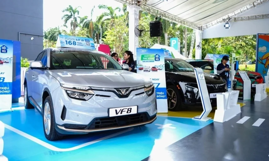 VinFast VF8 electric cars on display at a showroom, showcasing the innovative automotive sector of Vingroup.